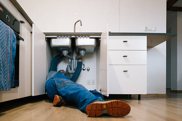 Professional Drain Cleaning technician working in Wenham, MA